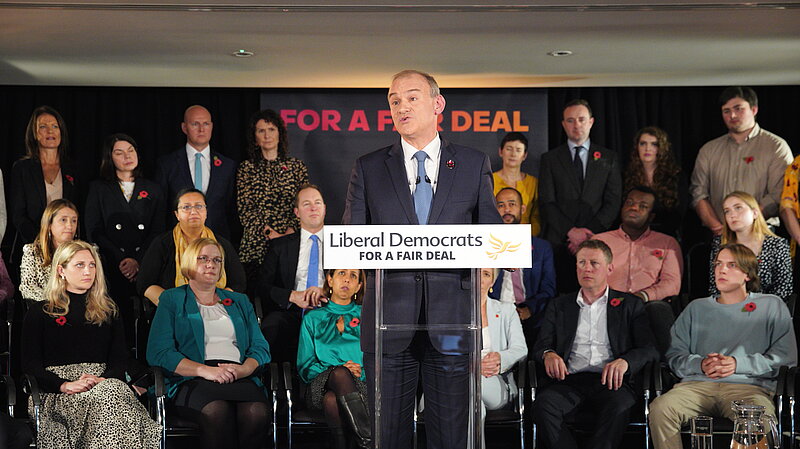 Ed Davey gives speech in front of seated audience